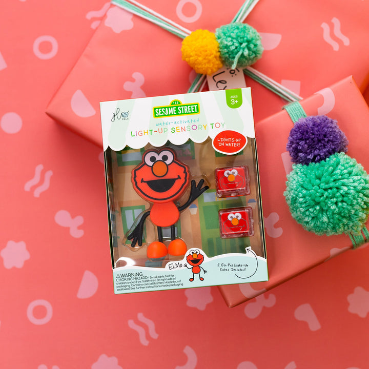 Glo Pals Sesame Street Light-Up ELMO Character With Two Cubes, Colorful Glow , Safe Water Play, Sesame Street Characters