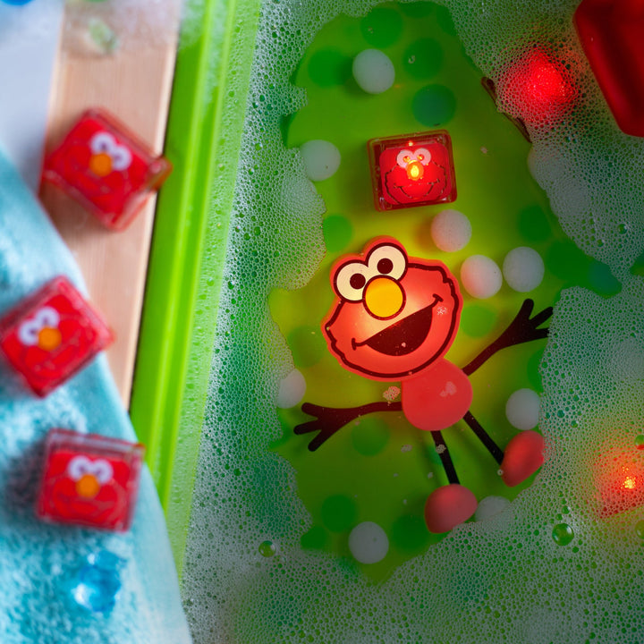 Glo Pals Sesame Street Light-Up ELMO Character With Two Cubes, Colorful Glow , Safe Water Play, Sesame Street Characters